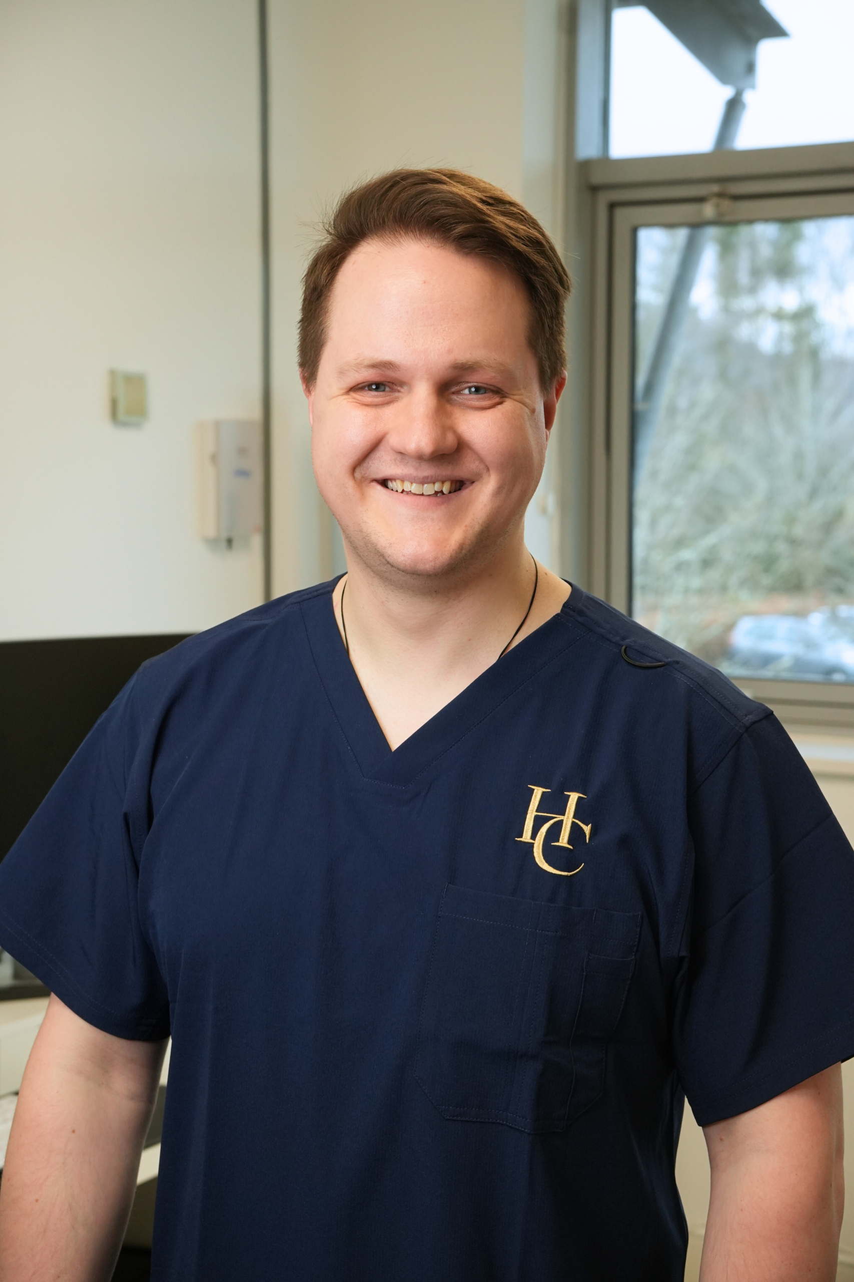 A Hearing Clinic UK clinician explaining what to expect from professional ear care